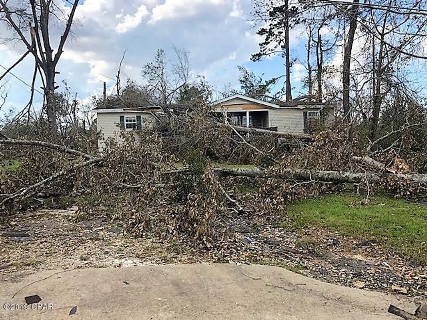 This is being sold for the lot only.   It comes with public water and sewer and is a good investment property.  The mobile home suffered damages from the hurricane.