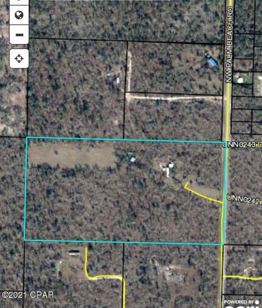 20 acre on a paved road in Calhoun County. Property has an older single wide trailer and a couple outbuildings. Private well and septic. 50 amp RV hookup w/ water on site also. Tons of potential. .5 of a mile from Lake Mckenzie