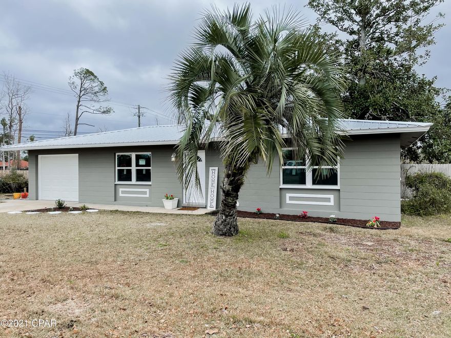 Check out this stunning Florida Cottage Style Home! NO HOA and NO FLOOD INSURANCE REQUIRED. This home has been completely renovated with beautiful details. The home features an open floor plan with a very spacious living room, kitchen and dining space. The kitchen features brand new soft close, shaker cabinets, granite countertops, deep sink, pull down kitchen faucet, stainless microwave, range, and dishwasher. The entire home features new flooring, top of the line LVP flooring and marble tile in bathroom. The bathroom features a brand new floating cabinet with granite countertops, marble tile shower, new toilet, lighting and faucet/sink. The seller did not spare any detail with the renovation, the home has new sheetrock, new lighting, new blown in insulation, New metal roof, new doors, all new windows, new interior and exterior paint, 5 inch baseboards, and closet packages.