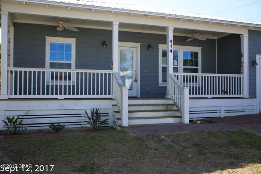 This beautiful Coastal Cottage Style home is located in the gated community of Paradise Grove.  The home has a wonderful open family area and a lovely kitchen.  Bedrooms are a split plan.  There is a covered porch and a large deck in the fenced back yard.  The home is located 3 miles west of Pier Park and only 3/10 of a mile from the beach.