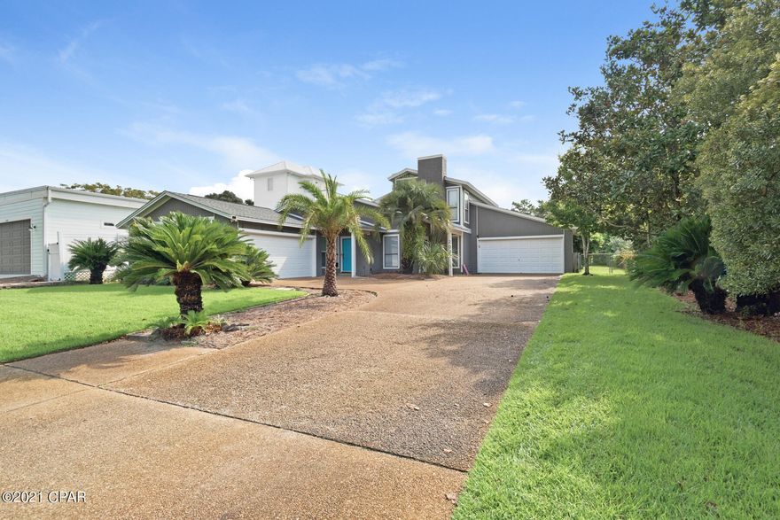 One of PCB most Unique Incredible and Current-Active Listings. The possibilities are endless. This multifamily duplex has been updated top-to-bottom. Side A - True ranch with 2 beds, King and Bunk room +, 2 Full Baths, 2 car garage; True primary ensuite w/private backyard access to pool. A generous family room w/fireplace & entertainment area. The kitchen is galley style w/full glass slider to side patio, there is a counter height island plus an eat in area w/ table. Side B - 2 story home w/3 Bedrooms, King, Queen, Bunk room, 2 baths, 2 car garage, large family room, large gallery kitchen with oversized dining table. Slider off kitchen to oversized patio and outdoor kitchen area that leads to the pool. This outdoor paradise is a true oasis, it's where outside sq. footage REALLY counts - secluded, established landscaping, green space galore. One key feature of this home is the over sized fire rated interior door that separates the 2 units. Keep both units independent - or open door and the property immediately expands into a 5 bd, 4 bath, 4 car garage, double kitchen, 2 family rooms able to host any large format group. Keep it small and intimate or bring ALL, this house can accommodate. Zoned sprinkler system front and back yard fed by well, public water and sewer (no septic), separately zoned HVAC. The BEST for last, Gross rents over $80,000.00, year 2021. Current 2022 rental projects estimate 85-105k gross. Not only can you enjoy the many amenities this home brings, you can generate income, and have a legitimate Lifestyle Asset.