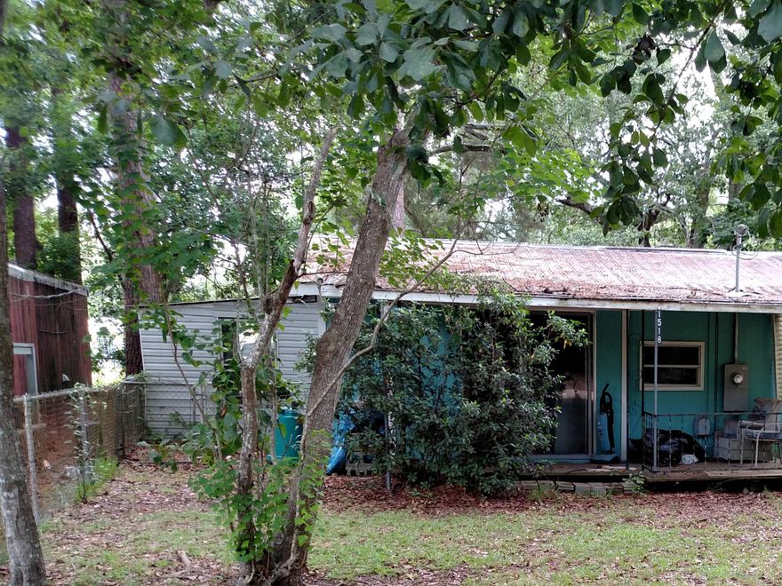 Great fixer-upper. This listing actually includes the adjoining lot behind the home.  Together, that's 1/4 acre.  Motivated seller.