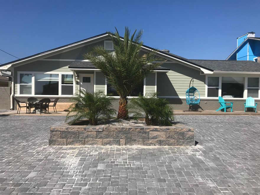 Spectacular beach home with endless rental opportunities and Beautiful views of the Gulf!! Not only is this home in a great location, this updated 4 bedroom home can be rented as a whole or be rented as TWO seperate units! Watch beautiful sunsets from the living room as you are steps away from the white sandy beaches! This home was completely remodeled in 2017 including new HVAC system, tile flooring throughout, appliances, paint inside and out, new master shower and baths, windows, doors, new pavered driveway and side yard with storage building and the list goes on! Withstood Hurricane Micheal with no damage but a few shingles blown off. New roof March of this year! Come see this Beautiful beach home today!!