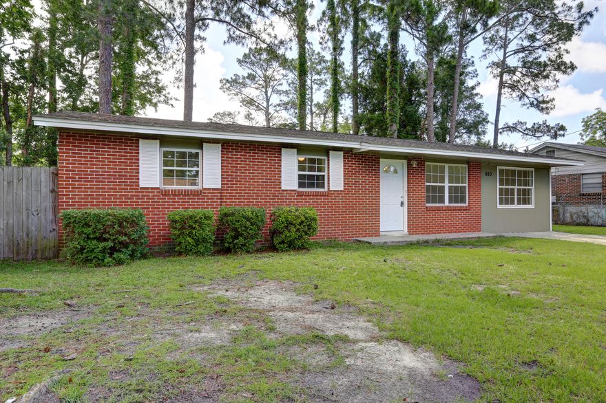 NEWLY REMODELED BRICK HM with lots of natural light and no carpet! Laminate flooring in bedrooms, tile everywhere else. The garage has been converted to a wonderful family space, where a large laundry area is located. The kit has new cabinets and countertop and is open to the eating area. The bathroom is clean and fresh. Nice backyard with large patio.