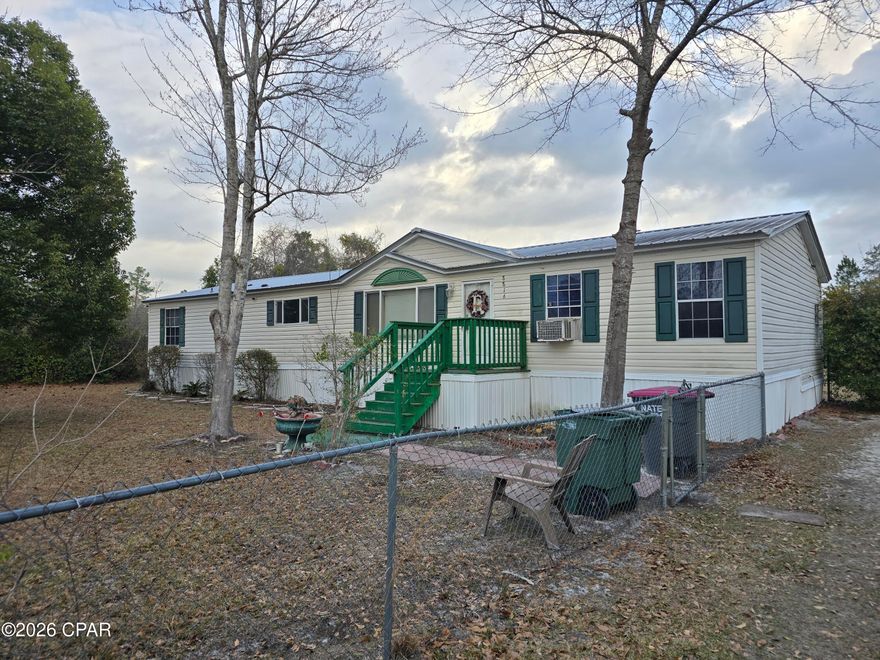 If you are tired of the hustle and bustle of town living and just looking for a more rural area with more room to grow and privacy. Then you have found it!! This property has it all. Siting on a beautiful acre of land that is fenced in gives you plenty of room for boats, campers, ATV's, even your very own garden/////// You can clearly see the '' pride in ownership '' the seller had in the years living here by the condition of the property. This home itself is over 1800 sq. ft. With a little TLC you can personalize this home to be your very own and meets your families needs. There are a total of 3 outbuildings on the property for PLENTY OF STORAGE!!! Call to see it today, it will not last long at this price///