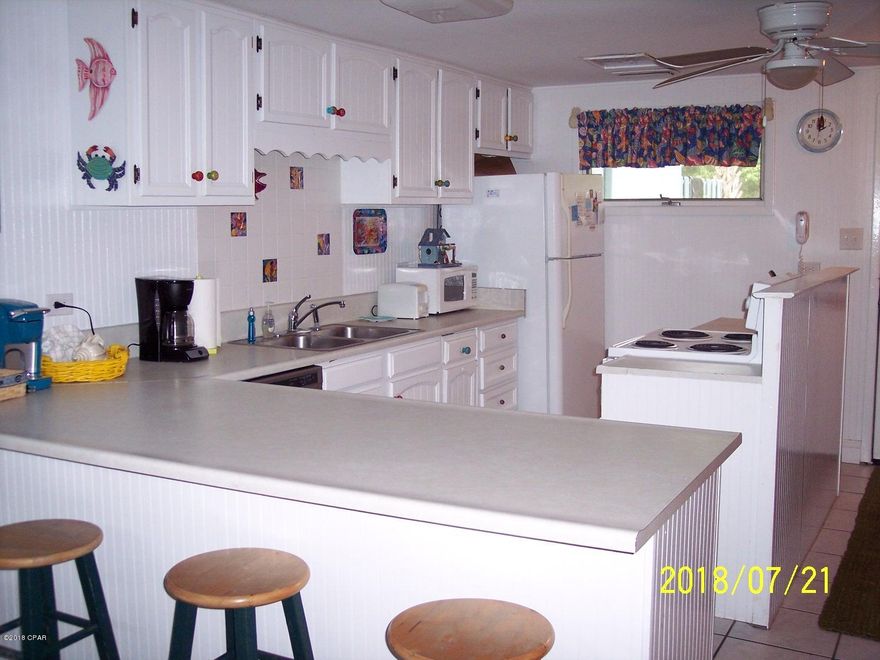 Sunny Side Beach & Tennis Resort is located on 18 private acres on the  Quiet West End of Panama City beach. This 74 unit complex has a club house , rental office, wireless internet, two pools, basketball, 4 tennis courts, pickle ball, shuffle boards, kids play ground and plenty of open space for kids to play. Easy access to the beach. This particular villa has been updated. All room sizes are approx. If important please measure.