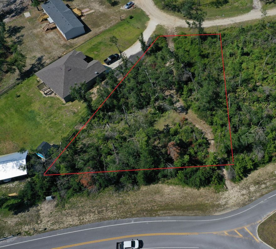 602 Hickory Bluff, named for the tress and high and dry land, here is a building lot, ready for a new construction home surrounded by new homes and a short distance to Fanning Bayou, fishing, boat ramp and just a few miles from Lynn Haven. The lot is right at a half acre with no association fees so bring your boat, RV, build a pole bar or workshop. Peaceful, quiet and ready to go today! Bonus, possible lot / home package if interested! Come tour this one today!