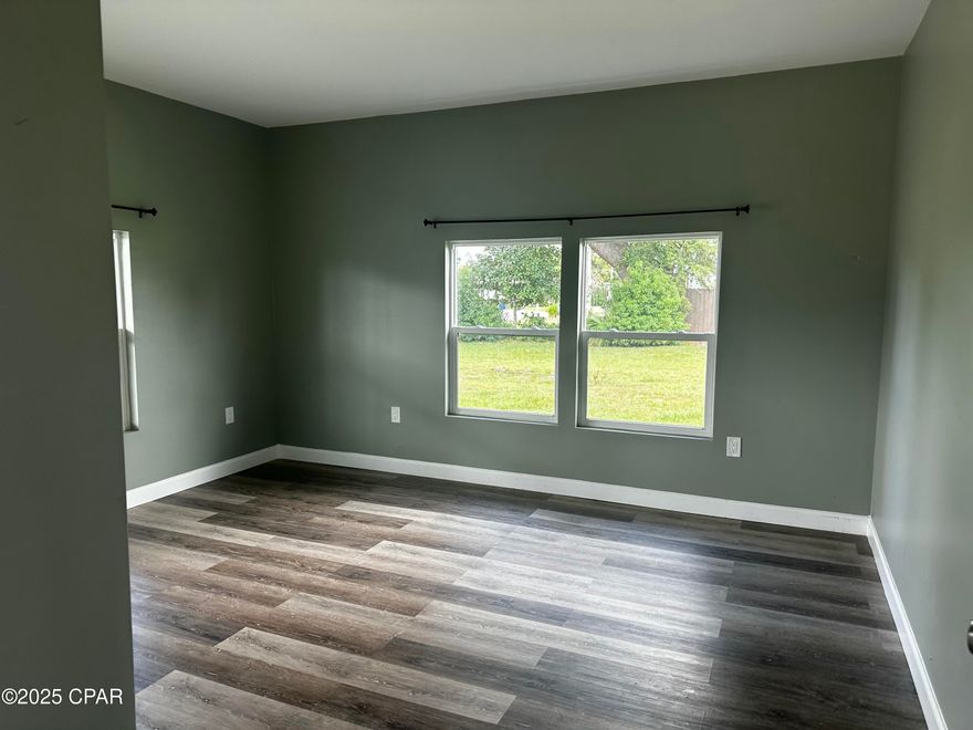 Step into style and comfort in this beautifully renovated large open floor plan 2 bedroom, 1 bathroom home. Featuring a sleek kitchen, open dining area, cozy living space, and a convenient laundry room, this modern retreat is move-in ready. Enjoy outdoor living on the inviting porch and in the spacious yard, perfect for relaxing or entertaining.