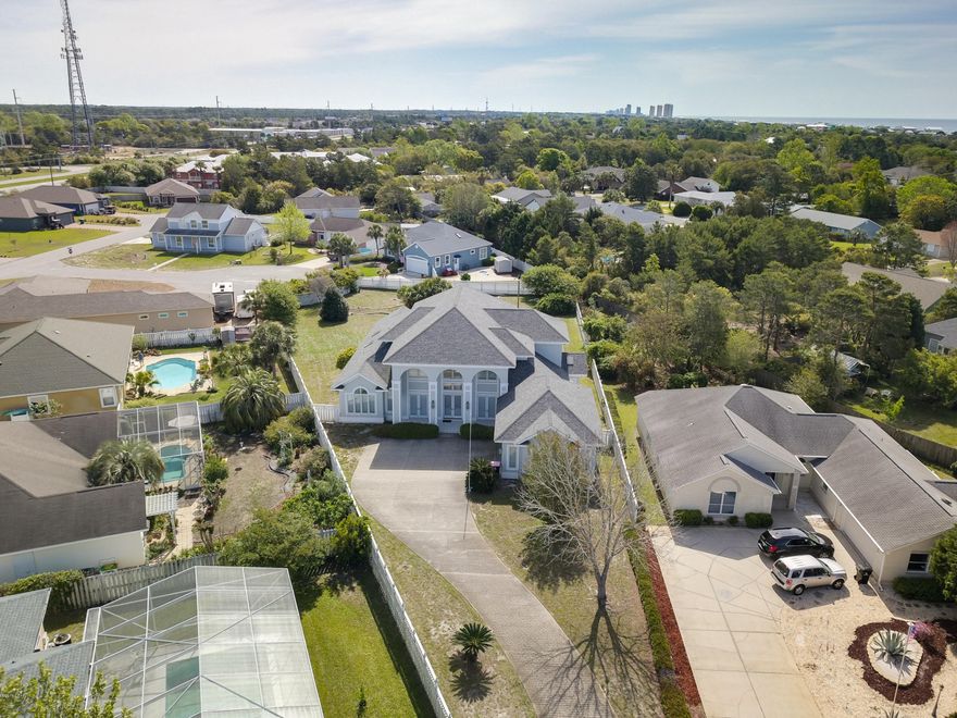 You must see to believe the beauty of this Grand Luxurious 5 bedroom and 6 full baths home! This home has an office, great room, laundry room, formal dining and living area with lots of storage, and a climate controlled 2 car garage. Upon entry, you will be blown away by the spacious living area with elevated ceilings and views from the entrance extending to a large heated pool/hot tub with expansive yard and enclosed two-level patio. The second floor overlooks the living room and continues with wrap-around views of the home. The kitchen is enormous and a show stopper! It is a chef's dream with a huge open concept looking into the great room with floor to ceiling windows, a breakfast nook, additional office nook, bay window, and full-size walk-in pantry with granite counter tops.