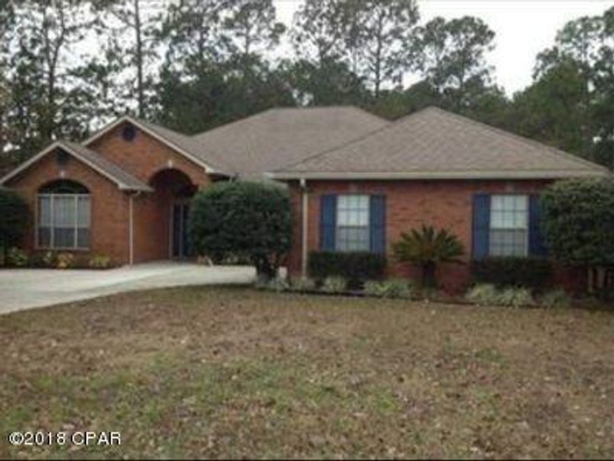 Location and a wonderful large home with 2627 square feet. 4 bedrooms and 2.5 baths in the prestigious Mill Bayou Subdivision with a pool, is hard to find in this convenient Lynn Haven area. You get almost a half-acre of land that is situated on a quiet cul-de-sac in an established neighbor of executive style homes. The interior of this home has so many upgrades including hardwood flooring, brick fireplace and movable island in the kitchen. This is an amazing split-bedroom design having a separate formal dining room and a large family room plus office. The all brick exterior with side entrance garage and stamped driveway gives this home exceptional curb appeal. The big back porch affords you the opportunity to enjoy the yard and lovely in ground gunite pool. Custom built storage building. with roll up door and separate entrance door in a back yard that has a rear double gate exit to Harvard Blvd. This allows you to store a trailered boat or motor home in the back yard. Just minutes to N. Bay Haven academy and Bay Haven Charter school and the local military bases.