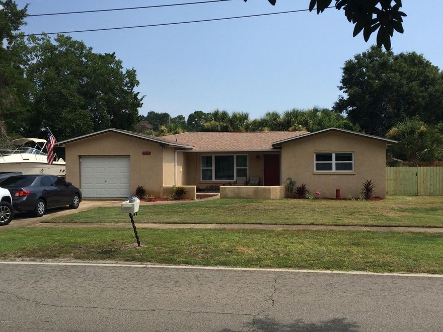 Great Florida cottage located on the East end of Panama City Beach. Only minutes from the Navy Base and a short drive to the beach. Also, Publix and Winn Dixie are just around the corner, making shopping easy. This home features an open living room, dining room,and kitchen combo. Hardwood floors in main living area, carpet in the bedrooms. Fenced back yard with 1 car garage, and additional parking in the driveway.