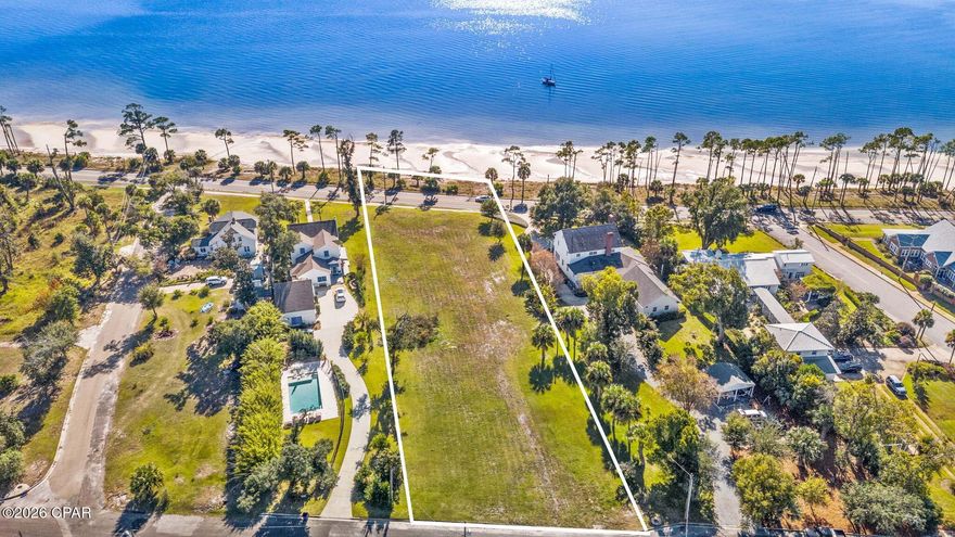 This is your opportunity to own a 1.17-acre, WATERFRONT estate-size homesite on iconic Scenic Beach Drive in Panama City, Florida with NO HOA! Perfectly positioned with stunning Bay views, this exceptional property spans street-to-street and includes two parcels extending down to the Bay, creating a truly unique setting for your future waterfront dream home.

This size homesite in this location are not available often offering a unique blend of privacy with the homesite size and desirable location in between Historic St. Andrews and Downtown Panama City. With 132 feet frontage, this homesite provides a generous, buildable footprint ideal for an estate-sized home. 

Zoned R-1 for single family homes, the property is ready for your vision and allows flexibility in design without HOA restrictions. Deeded waterfront access further enhances the value and lifestyle appeal, making this one of the most desirable opportunities along Scenic Beach Drive.

Ideally located between Historic St. Andrews and Downtown Panama City, this homesite places you at the heart of a vibrant coastal community. Enjoy walking or biking to local farmers markets, breweries, boutique shops, marinas, and a variety of dining options. Scenic Beach Drive is known for its bike-friendly streets, community events, parades, and classic waterfront charm.

The waterfront lifestyle extends far beyond your backyard. Launch kayaks or paddleboards, anchor your boat for the day, enjoy a refreshing swim, or simply relax and take in the ever-changing Bay views. And when summer arrives, experience one of Scenic Beach Drive's most beloved traditions, Fourth of July fireworks over the Bay...best enjoyed from the comfort of your own home.

With its rare size, premier location, Bay views, and no HOA, this estate-size homesite offers endless possibilities to create a custom waterfront retreat and fully embrace the Florida coastal lifestyle.

Survey is available.
