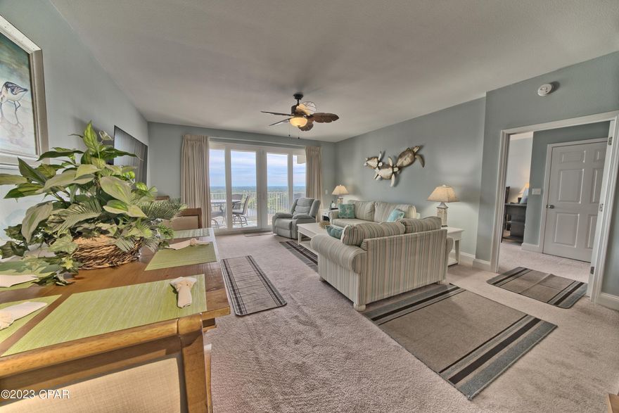 CURRENTLY UNDER CONTRACT, SELLER WILL CONSIDER BACKUP OFFERS... Owned by a primary resident, this immaculate condo can be your new home or investment at the beach. Largest floorplan in Laketown Wharf, this 3 bedroom, 3 bathroom, with bunk room, 14th floor condo, sleeps ten people comfortably. The master bedroom, living room and kitchen have amazing views of the sunrise, lagoon, lake, golf course and large boardwalk. Granite countertops with Island Breakfast bar.  Recent updates include 2020 HVAC, 2023 new water heater, lighting, 2022 stainless steel appliances, 2020 washer and dryer, smoke detectors, beautiful artwork, fully furnished. Amenities include 5 pools, splash bar and grill, putting green, pickle ball court, storage units, and fitness center with views of the Gulf. 6 Restaurants on ground floor, Hair Salon, Ice Cream Shop, Nightly Fountain and Light Show. Convenient beach access steps from your condo. Building and grounds are very well maintained, 24 hour security and Front Desk in a large lobby. Huge parking garage. Can rent weekly and long term.