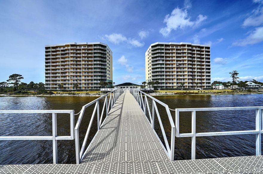 HIBISCUS BY THE BAY is one of the most unique waterfront developments in our area with its own protected marina on a 1o acre site along with luxury living overlooking St. Andrews Bay. This spacious and bright unit has an open floor plan with lots of natural light. Master bedroom is waterfront with sliding door access to the balcony, tray ceilings, double vanity, and walk-in closety. This gated residential community offers large outdoor pool and spa, pool deck with gas grills, tennis court, activity center room, private owners lounge and workout room. All dimensions are approx.