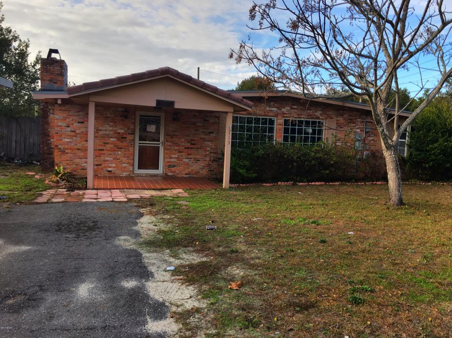 Great location near Pier Park! With the beach, shopping and restaurants just minutes away, it doesn't get any more convenient than this! This brick home has a large living room with laminate floors and a fireplace. The kitchen has plenty of cabinets, a breakfast bar and dining area. There is a bonus room off the master bedroom. The door from the master suite leads out to the huge yard which has a pool and workshop.