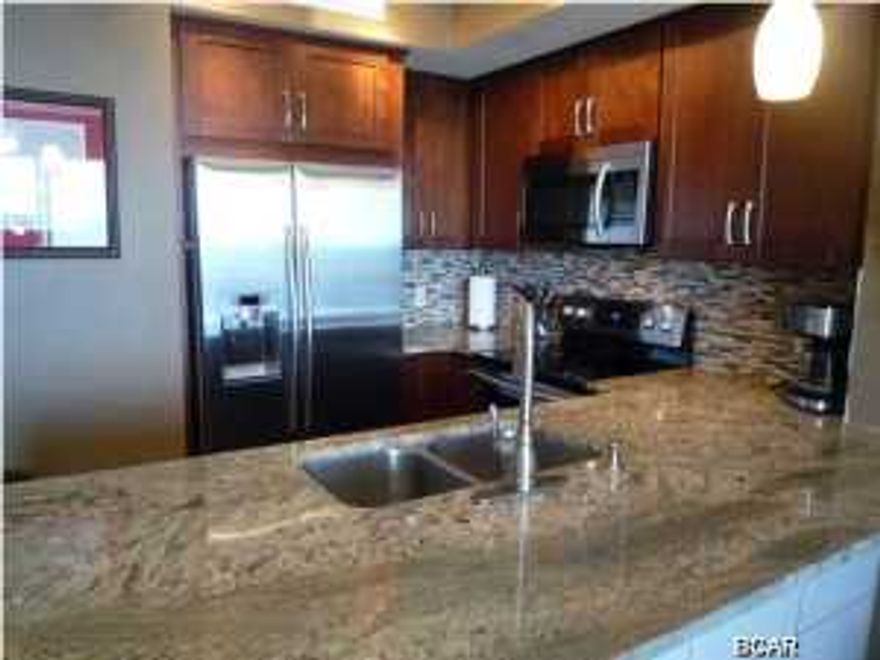 FULLY FURNISHED-NON RENTAL-GORGEOUS UPDATES-INCLUDING CUSTOM CABINETRY; GRANITE COUNTER TOPS; UPDATED LIGHTING; NEW APPLIANCES; FRAME-LESS GLASS SHOWER ENCLOSURE. THIS FLOOR PLAN FEATURES BUILT-IN BUNK BEDS (UNIT SLEEPS 6), 2 FULL BATHS, SPACIOUS LIVING ROOM AND DINING ROOM WITH EXTENDED TILE, 9' CEILINGS, LARGE PRIVATE BALCONY, WASHER/DRYER, COMPLETELY & BEAUTIFULLY FURNISHED. CELADON BEACH IS LOCATED ON THE MUCH DESIRED WEST END OF PANAMA CITY BEACH. A AMAZING VIEWS FROM THIS BEAUTIFUL CONDO. CELADON RESORT OFFERS ALL THE AMENITIES FOR A PERFECT SECOND HOME OR OUTSTANDING BEACH RENTAL. RESORT FEATURES INCLUDE 283' GULF FRONTAGE, HEATED GULF FRONT POOL WITH SPA, INDOOR/OUTDOOR HEATED POOL, 2 HOT TUBS, TENNIS COURT, MEETING ROOM, FITNESS FACILITY, 4 LEVEL PARKING GARAGE WITH