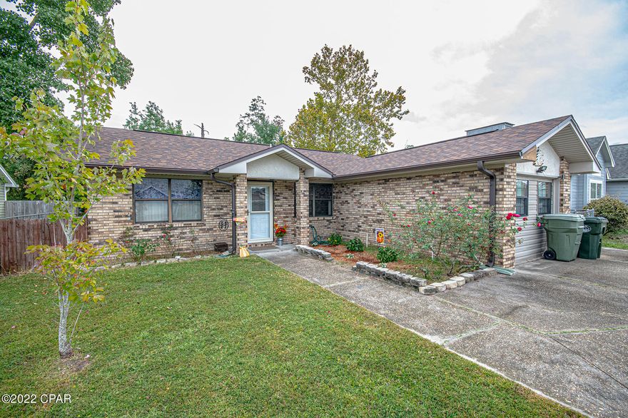 Welcome home! This cute brick home in Lynn Haven is a 2/2, it has a fenced back yard & it's on a cul-de-sac. The roof was replaced in 2019, A/C 2020 & water heater in 2021. Fresh paint, new screens on the back porch & 2 sheds. There is a den off the primary bedroom that leads to the back porch. Property appraisers' website has the home as a 3 bedroom.  Originally the home was a 2 bedroom & the garage was converted into a 3rd bedroom. The wall separating the living room & a bedroom was removed so now it's back to a 2-bedroom home. You can replace the wall to make the home a 3 bedroom again. Not in a flood zone. Come check is out today! Call for an appointment.