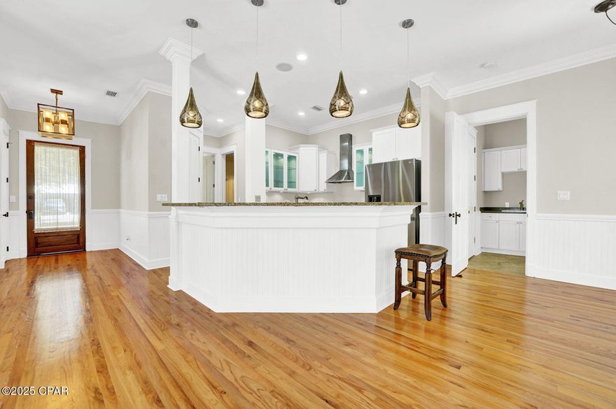 Nestled in a quiet gated community in beautiful Panama City Beach, this charming 2-story home offers the perfect blend of comfort, style, and coastal living. Boasting 3 spacious bedrooms and 3 full bathrooms, the residence is ideal for families or those seeking a relaxing beachside retreat.

The home welcomes you with a brick paver driveway leading to a single-car garage, surrounded by lush tropical landscaping and tall palm trees that add to the serene ambiance. Inside, you'll find a thoughtfully designed floor plan with abundant natural light, builder upgrades, custom light fixtures, and ample space for both entertaining and relaxing.

Upstairs, the private primary suite offers a tranquil escape with its own en-suite bathroom occupied by a large walk-in closet, while the additional bedrooms provide flexibility for guests or a home office.

Located in a peaceful, gated neighborhood, residents enjoy access to exceptional amenities, including a community pool, basketball courts, and a playground—making it a perfect setting for both active and laid-back lifestyles. Whether you're looking for a full-time residence or a second home this home captures the essence of coastal living just minutes from the beach, shopping, and dining.