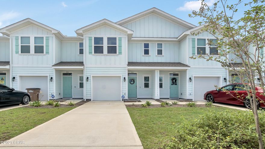 Amazing townhome w/gorgeous community pool! Come enjoy the maintenance free lifestyle of Hathaway Townhomes w/yard service provided! As you walk in you'll love the luxury vinyl plank flooring & overall spaciousness of the home. Downstairs features a large kitchen w/granite counter tops & stainless steel appliances, enormous living room w/ dining area & a half bath. Upstairs you'll find an extra large master suite w/inviting bathroom featuring double sinks, walk-in shower & linen storage. The other side of the upstairs boasts a laundry room w/full size washer and dryer, spacious full bathroom & two bedrooms that have nice size closets. Many furniture items stay! This townhome is minutes to the beach, Pier Park, restaurants, & more! Short term rentals aloud & great rental income. Must see!