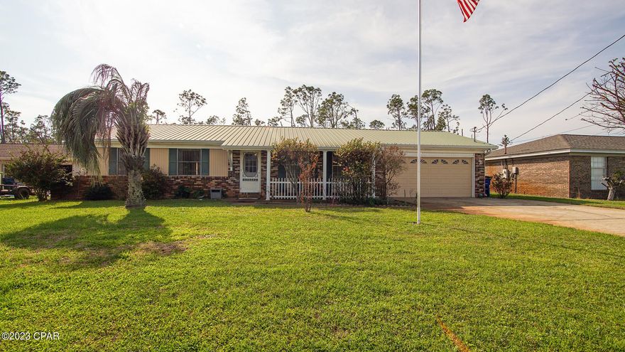 CURRENTLY UNDER CONTRACT, SELLER WILL CONSIDER BACKUP OFFERS. Well kept home centrally located to Tyndall AFB, NAS PC, and all the shopping you need. This home features 3 bedrooms, 2 baths, and tons of storage. Traditional floor plan with a spacious living room as you enter, which leads to the kitchen. The galley kitchen has been updated with granite. The  dining room is adjoined with the kitchen, with extra room for a desk. Enjoy an additional living space with the enclosed sunroom.  In addition to the attached two car garage, there are 3 sheds in the backyard. The largest shed is 18x14, perfect for a woodshop. There is no HOA and is located in flood zone X.