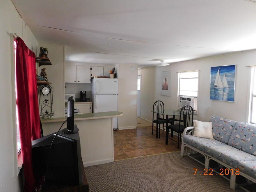 Waterfront canal accessing Deer Point Lake as well as Econfina and Bear Creeks. 2 bedrooms furnished home ready to occupy. Located on a private dead-end road.  Fish from your dock or boat on the Lake. Great primary or getaway. This property shares a well with the adjoining lot and will need its own well. Adjoining property is also available. MLS 740884 vacant lot, purchase both  for 150' waterfront, giving you almost 1/2 acre for both.  Call for more details.