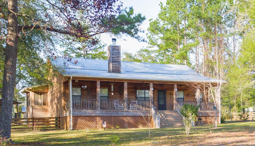 Welcome to River Ranch Retreat! A private community located directly on the beautiful Holmes Creek. This Custom Built 2 Bed 2.5 Bath home is full of upgrades and boasts high end appliances in the kitchen. This home has 9 ft ceilings with an open and very spacious floor plan that will allow you to entertain friends and family throughout the year! The screened porch in the rear of the home is enormous and creates a wonderful indoor/outdoor flow. With a workshop, fire pit/grilling area, RV Barn in the back and boat launch located just a few 100 feet from the front door, this is a perfect property for you to bring all your toys and unwind and relax in this peaceful and quiet Florida Creek front atmosphere. This home is very well built and meticulously maintained. Don't miss out!