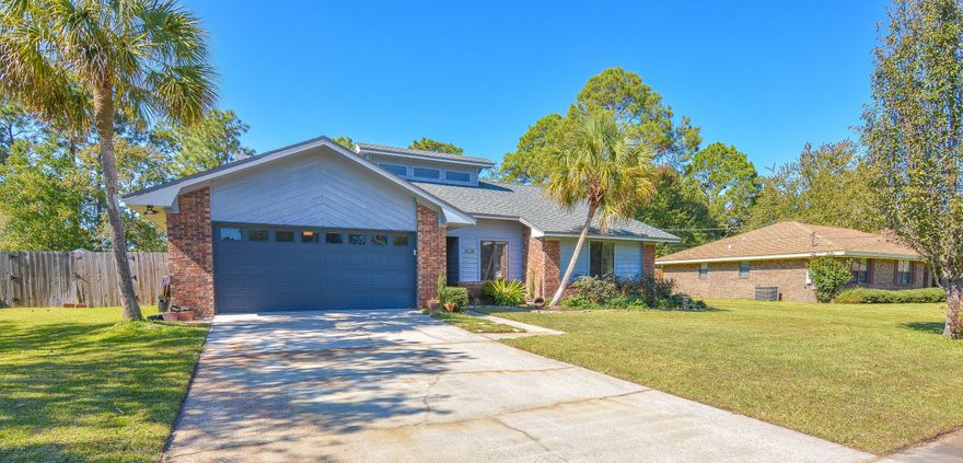 This beautiful home is conveniently located minutes from Panama City's popular restaurants, strip malls, grocery stores and the Panama City Mall. Recently remodeled; It features cathedral ceilings, along with a very large master bedroom, a fireplace in the living room, and a new roof that was put on in 2013. This home right under 1,800sf has a very nice floorplan with great use of space.