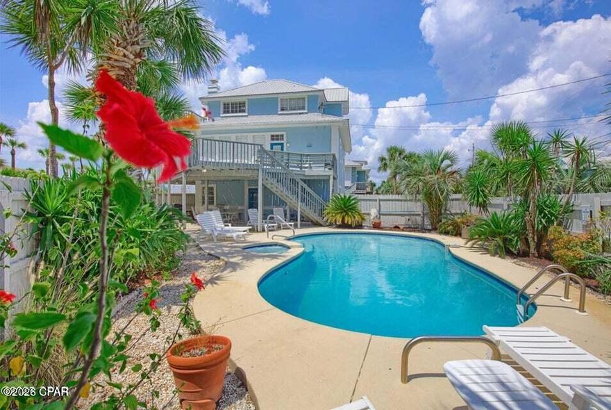 OPEN HOUSE SUNDAY MARCH 8TH  12-2!
RARE opportunity to own a furnished, Gulf-view home with private pool and dedicated beach access -- no crossing public roads to reach the sand. Located just steps from the Gulf on a private beach access street with no thru traffic, this property offers a unique combination of privacy, convenience, and strong investment potential. This 4-bedroom, 3-bath also features an additional loft area, providing flexible space for guests or additional sleeping quarters. The fenced backyard is designed for entertaining, complete with a private pool and spa, creating your own coastal retreat. Short-term rentals are permitted, making this an excellent primary residence, second home, or income-producing property. Ideally situated in Panama City Beach and within walking distance to local favorites including Gypsea Crepes, Finns Island Style Grub, and Liza's Kitchen, as well as close to shopping St Andrew's State Park. Properties offering Gulf views, private beach access, and a private pool at this price point are extremely limited. Schedule your private showing today.