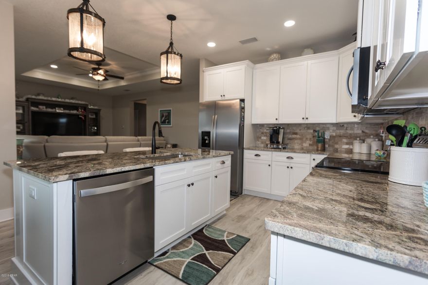 CURRENTLY UNDER CONTRACT - ACCEPTING BACK UP OFFERS. Beautiful 2019 constructed home for sale in Open Sands. This home offers 4 bedrooms and 2 full bathrooms. Interior features include custom tile, granite countertops, stainless appliances, tray ceilings, and much more! Includes builder warranty and termite bond. Home is meticulously cared for by owners. Open Sands is close to everything - Pier Park, restaurants, and the BEACH. Make your appointment today!