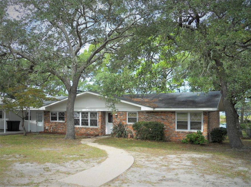 Beautiful Waterfront Home with AMAZING views of the Bay from large sunken great room beautiful brick wood burning fireplace (tenant to have inspected if used) and two of the bedrooms, one which offers a large sitting room and opens to screened in porch to sit and enjoy the beautiful Bay View! Lots of living space and this home has a large fenced back yard with storage shed! Home also has an additional large den that could be used as extra bedroom or office, you will find tons of living space in this home and lots of outside space to enjoy as well, including a dock for fishing! Located close to Tyndall Air Force Base and shopping!!

Pets allowed with owner approval and non refundable pet fee.