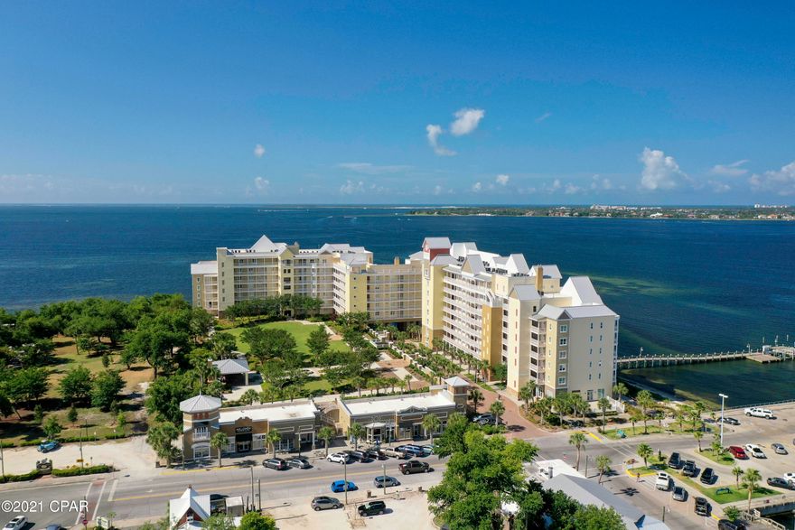 CURRENTLY UNDER CONTRACT, SELLER ACCEPTING BACKUP OFFERS.  Your bay front oasis awaits! This exceptional 3 bed/3 bath condominium located in the beautiful community of Harbour Village features gorgeous waterfront views from the moment you walk in the door. The interior offers a spacious open floor plan, raised ceilings, crown molding, wood look tile floor in the main living spaces and the master en-suite.  This floor plan boasts one of the largest kitchens with ample cabinets and countertops including a breakfast bar.  A unique corner window gives lots of natural light and views while preparing meals.  Just off the living room is a serene private balcony overlooking the pool and the bay. Conveniently located in Historic St. Andrews, walk to local restaurants, boutiques, and coffee shops. Don't miss out, call today! New HVAC in 2019 with Nest thermostat.  The building roofing was replaced in 2019, repainted in 2020, new pool surface, boardwalk, and dock decking.  This unit's balcony has more protection from winds that may kick up during a summer shower making it pleasant to relax and listen to rain.  South Facing one of only twelve units boasting nine windows, with beautiful views of the pass and Shell Island, watch the ships come and go from the port and Navy Base.  Enjoy Pelicans, Osprey, Cranes and Herons; delight in the ocean breezes, and beautiful sunsets with sandy white beaches that make Buena Vista Pointe a picturesque surrounding.