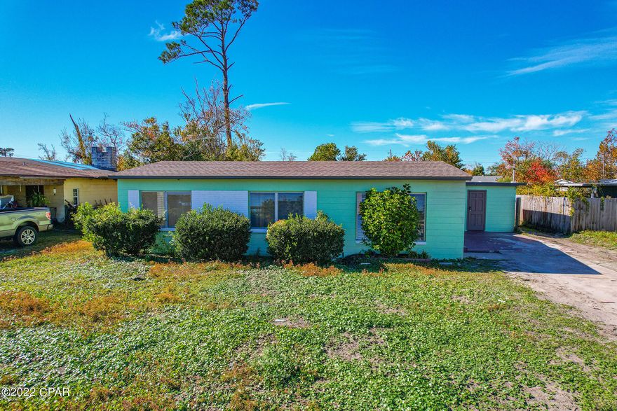 'CURRENTLY UNDER CONTRACT, SELLER WILL CONSIDER BACKUP OFFERS' This beautifully renovated 3 bedroom home has over 1,400 sq ft of comfortable living space. In the kitchen you'll find brand new cabinets with plenty of storage, and butcher block style countertops, backsplash, and new appliances. The living and dining area flow together, and will serve as the perfect place to relax, or entertain family and friends. The primary bedroom is spacious, and has a nice sized closet. The bathroom is brand new with all new lighting, fixtures, and a tiled shower. In the other two bedrooms you'll find plenty of room for sleep and study. Throughout the home there is amazing natural light, making it feel light and airy inside. In addition, this home has a large bonus room off the kitchen that could serve as an office, mancave, or  playroom, and an additional enclosed storage area. Step outside into the back yard and you'll be thinking of all the ways to make it your own! Perfectly located in St. Andrews it is close to so many shops, local restaurants, and entertainment. You're within 1.5 miles of St. Andrews Marina, and multiple public boat ramps, less than 5 miles to the Navy Base, and only 15 miles to Tyndall Air Force Base. A few renovations include a brand new roof, HVAC system, tile flooring, interior and exterior paint, trim, doors, light fixtures, just to name a few! This home is a must see!