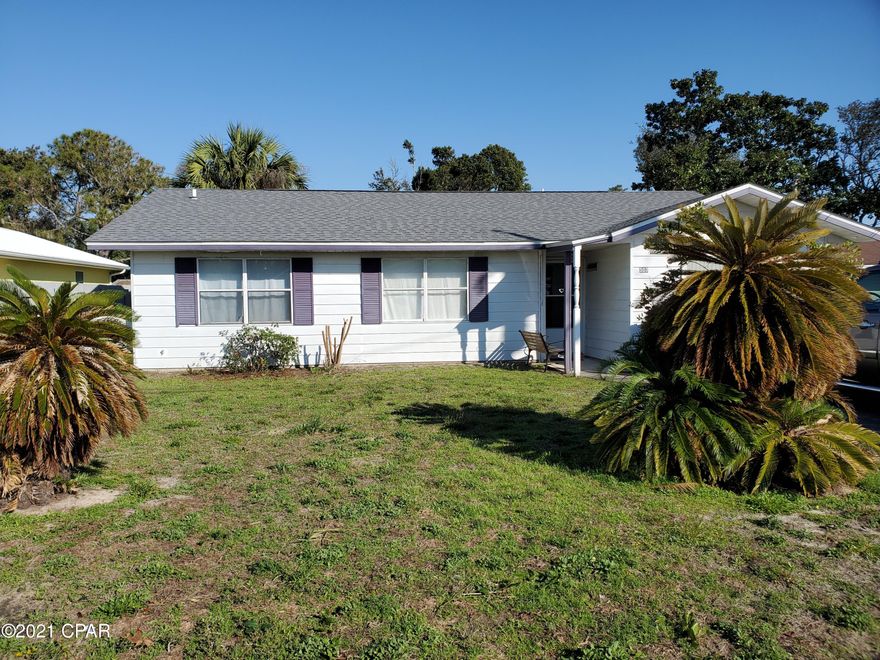 BEACH HOUSE with spacious backyard.  Citrus trees say YOU ARE IN FLORIDA!

New roof. This home is ready for cosmetic finishes.   Single car garage has been enclosed - add a bath in this large space and you have 3 bedroom and 2 bath !  Opportunity to SAVE $$ and CUSTOMIZE on home in great location.   WALK to the BEACH.  Lot is perfect for private SWIMMING POOL!