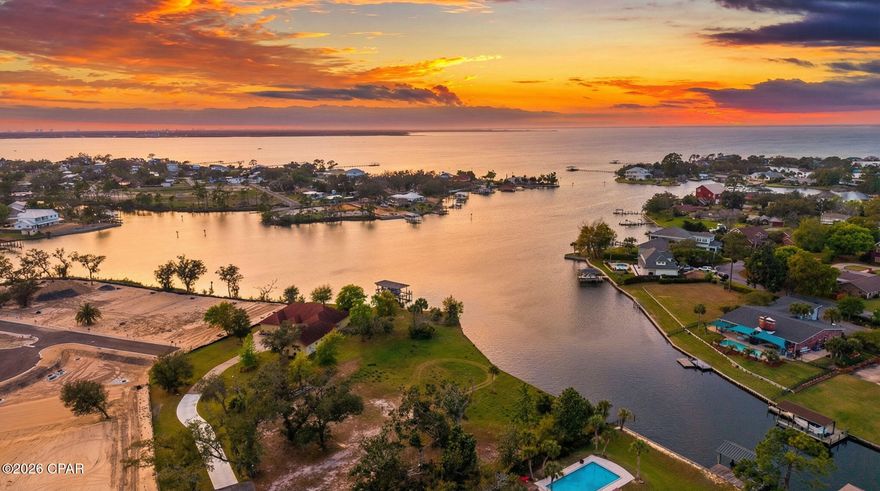 Step onto your future home sight in the most centrally located area in Bay Count; Kings Point! This rare opportunity provides you with almost half an acre to build your waterfront oasis and look at the most incredible sunset views from your back yard! 

With direct gulf access, you are just minutes from Shell island and the Pass Via boat!