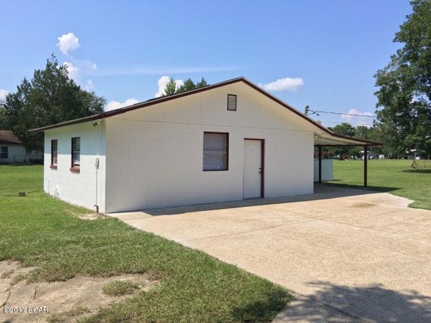 Perfect opportunity to own a rental in perfect condition or purchase a simple retirement home!! Home has one large bedroom, large living area, oversized closet, pantry, and good sized bathroom!! We have ceramic tile throughout and everything is super clean and move in ready! Home sits on over half an acre with two extra full size septic tanks for mobile home or RV. Property also has concrete RV slab in place. Great value, beautiful lot, and close to town! Thanks for your interest in Calhoun-Liberty life!