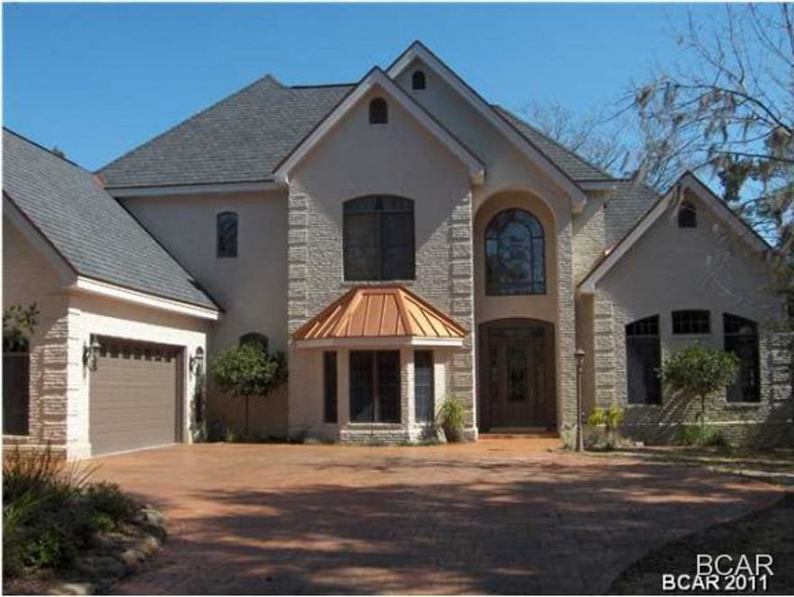 This is a builders personal home, on St Andrews Bay in The Preserve. Attention to detail with quality material makes this an outstanding home that will hold its value into the future & give the owners an elegant life style. Deck and pool area enhances the views that St Andrews bay offers. Two sitting areas off the master bedroom & exercise room offer great views. Currently permitted for 300ft dock.