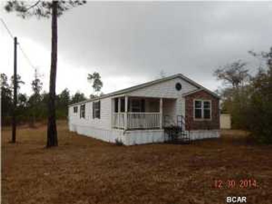 REDUCED!! Uniquely-built 3-bedroom, 2-bath mobile home on nearly an acre in Bayou George area. Master bath has a corner garden tub with separate shower, dual vanity, and large walk-in closet. Kitchen has a center island for additional workspace and storage. All measurements approximate, please verify if important.