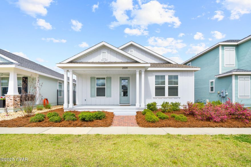 MOTIVATED SELLER! *SELLER OFFERING $10,000 TOWARDS CLOSING COSTS OR RATE BUY DOWN WITH ACCEPTABLE OFFER*** Welcome to 2009 Calamint St, Panama City--a Charming upgraded Perdido model in the sought-after SweetBay Community! This 3-bedroom, 2-bathroom, 1,703 sq. ft. home boasts a spacious split-bedroom floor plan, offering privacy and comfort. Step onto your inviting front porch and enjoy the refreshing Bay breeze, or entertain effortlessly on the large screened in lanai. Inside, you'll find natural light flooding through beautiful windows, 9-10 ft ceilings, and luxury finishes, including quartz countertops, stainless steel appliances, and designer kitchen cabinetry. This home has over $30,000 in upgrades, making this home move-in ready. Upgrades include additional recessed lighting in kitchen, soft-close drawers, upgraded cabinets,  premium brushed nickel bath fixtures, a tankless water heater, screened in lanai and tile throughout. Built for durability and efficiency, the home features Hardie board construction, low-maintenance aluminum fascia and vinyl soffits, 2'x6' exterior walls, and architectural shingles. A sprinkler system and beautifully landscaped yard, Sweetbay is also home to University Academy, one of Florida's top-ranking FREE K-8 public charter schools--just steps away from your front door! Nestled in SweetBay, one of Panama City's most desirable communities, you'll have access to North Bay for kayaking and paddleboarding, a resort-style swimming pool, basketball courts, walking and jogging trails, an amphitheater, and more. With parks and pet-friendly spaces, this neighborhood is designed for an active and social lifestyle. Don't miss out on living the Sweet Life in SweetBay!