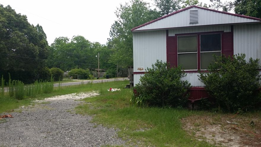 SELLER IS SELLING THE LAND WITH NO CHARGE FOR THE MOBILE HOME. GREAT CORNER LOT WITH CITY WATER.
