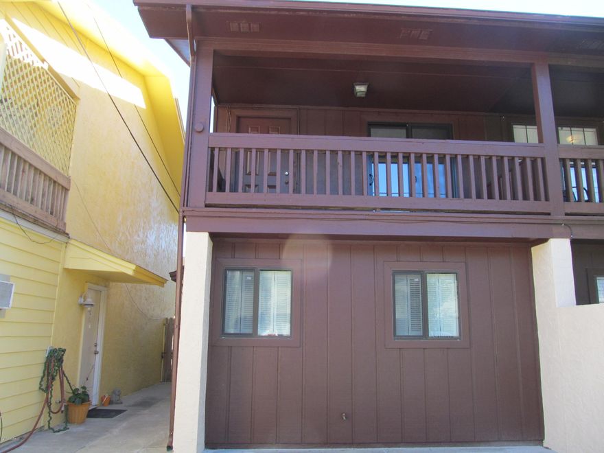 Remodeled 2 bedroom 2 bath townhouse just a short walk to the Gulf. Open kitchen/dining/living area with a balcony upstairs and bedrooms down. Fenced back area. Property is on septic- property has lift station on site.