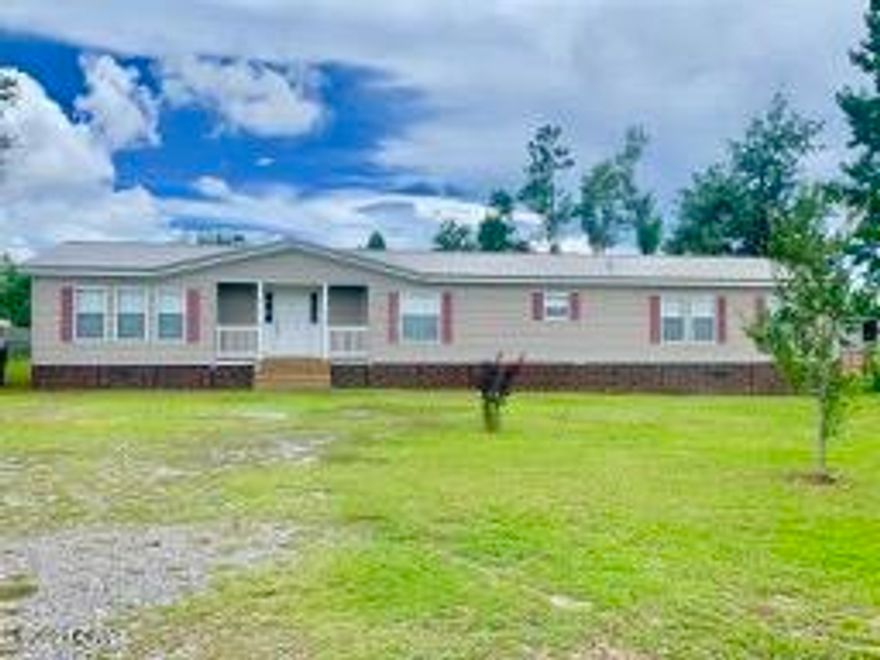 Wow, what a wonderful, large home, on a gorgeous lot!  This 4 Bedroom home boasts a split bedroom plan, an office/homework area with builtins, plus a Master Bedroom with ensuite that has  TWO walkin closets, a gun safe, whirlpool tub and a separate shower.  Beautiful wood-look  floors adorn the greatroom.  Outside you'll find over 1/2 acre, on a quiet paved road.  The lot is completely cleared with a POOL with deck across the rear of the home for those hot August days coming up.   The back yard is fenced, the roof is new and all this home needs are your personal touches and it's move-in ready.  (All info is approx and buyer to verify any info that is important.)