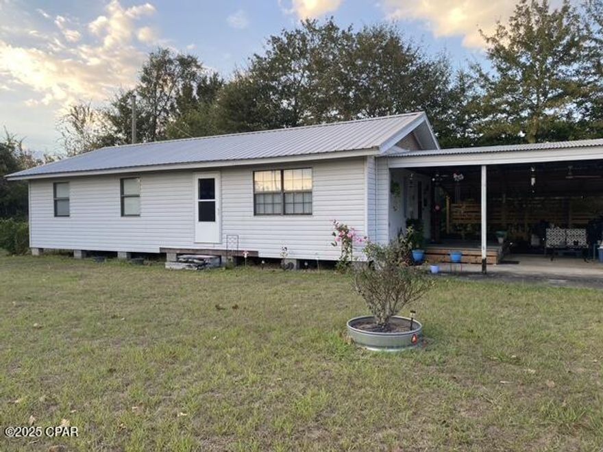 This well maintained newly renovated home is conveniently located. It is 45 minutes from Panama City, 30 minutes from Dothan, and 40 minutes from Tallahassee. Which makes it perfect fpr a family that has to commute for work. This two bedroom home also has an office that can be utilized as a third bedroom. The one acre corner lot with paved road access on both sides adds to the convenience of the home. The yard has many other features for a family like covered porch area and cooking area. It has a large concrete kennel and green storage. The best feature is the 48x24 work shop which has a lot of details that make it the perfect man cave!