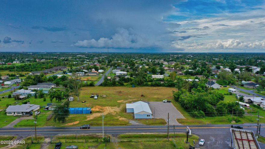 Rare opportunity to own a large Centrally Located  parcel with New Office space and Large open space for a multitude of uses.  The seller is in process of re zoning to General Commercial and Multi Use (Commercial)There is plenty of room for other large building. This property offering consists of 2 parcels with great access off of Transmitter.  The office building has been completely and extensively ''Gutted' and' remodeled. This should  constitute ''New'' build. Buyer should verify. Building includes Metal Roof, Hardi Siding, Commercial grade vinyl Plank, Camera System, Full kitchen, Granite upgrades through out. 2 Full Baths, 1/2 Bath with outside access for crew and ''Public'' bathroom.  Easy access to Hwy 231 and Hwy 98 Check the Documents Section of the listing for Development Plat and building Floor Plans.