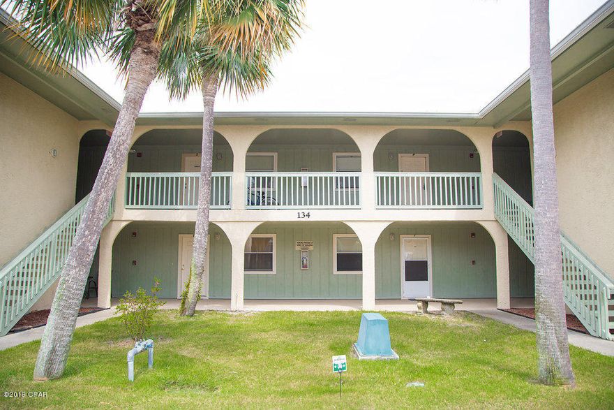 Well kept condominium, located on 1st floor.  Great investment opportunity or second home at the beach.  Complex includes restaurant and pool on Gulf side, 10 pools inside of the gated community, with 4 tennis courts and shuffle board courts.  A 2 acre miniature golf course. owner's pets allowed.  Also has 3.2 miles of street area perfect for walking or just riding your golf cart.