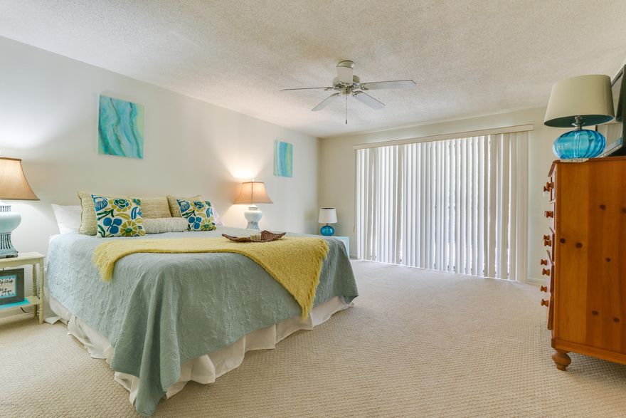 Well maintained 1,322 sq ft spacious villa with 2 Master suites and two full baths. Both suites have separate baths and sliding glass doors to a separate balcony. One large bedroom offers walk in closet and bathroom garden tub. Second large bedroom provides two spacious closets and attached full bathroom.  Living room offers a large ceiling to floor window with view of pond and fairway. Kitchen has garbage disposal, pantry, dishwasher, breakfast bar and ample storage. Washer and dryer included.  Roomy hallway closet for beach gear. Furnished and beautifully decorated with coastal furniture. Small complex with on-site maintenance. Close to all amenities.  No hurricane damage. Low HOA fees include water, cable, insurance, B, garbage, pest control, grounds maintenance.