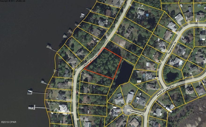 Build your custom home on this estate lot in Plantation point. This established neighborhood is 15 minutes to Tyndall AFB, minutes to shopping and restaurants, and many water activities. This is a high and dry lot, that offers views on the water and incredible sunsets. There are not many 1 acre lots left in in this subdivision, especially situated like this one with great views.