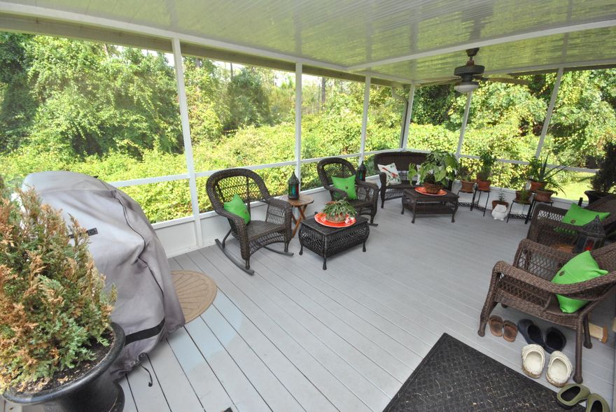 Motivated selller!  Owner says bring all offers!  One of a kind home located on a dead-end street in desirable Palm Cove!  Nestled in between a wooded area and an open space, this home offers unheard of privacy. Neighbors on only one side.  The oversized screened in porch is showered with shade from the mature trees that line the property and is double the size of the standard porches in this area.  Updated, freshly painted and all flooring throughout this 3 bedroom 2.5 bath home. This home clearly shows the care that the owners have taken. Palm Cove offers two pools, a playground, low HOA’s, and nightly on-site security guard.