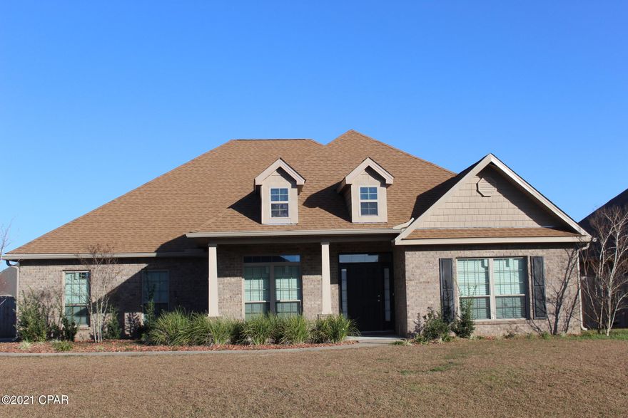 Lovely custom built home with an open concept design with archways & tray ceilings throughout.  Split bedrooms plan.  Spacious kitchen features plenty of cabinetry, granite counter tops, island, and walk-in pantry.  In addition to a breakfast nook. Large Master bedroom with tray ceiling, access to patio.  Master bath has garden tub with separate tile shower & bench, plus the walk-in closet. Formal dining area, plus a bonus room for home office.  Tile flooring in wet areas, custom wood flooring featured in formal rooms, and carpeting in bedrooms.  Cover back patio area for entertaining and grilling.  Backyard is privacy fenced.