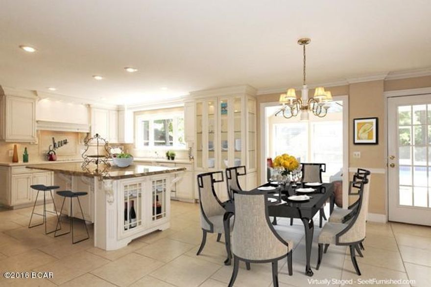 SO MUCH STORAGE HERE!!! This beautiful custom built home features a large open kitchen with stunning, granite top island, lighting in two display cabinets and a spacious breakfast area. Great for entertaining! There are two sets of French doors leading to the large screened patio overlooking the sparkling, in-ground pool. The sunroom overlooking the pool offers panoramic views of the nicely landscaped back yard. The owner added features such as extra storage space under the stairs in the coat closet (great for storing the Christmas décor). Mentioning décor, you'll notice the electrical outlet above the fireplace, great for those lighted Christmas decorations! Upstairs the master suite boasts two closets, one oversized with plenty of storage space. There are 3 additional bedrooms upstairs, one includes a walk in cedar closet. There are vaulted ceilings in each of the bedrooms. Coming back downstairs, the living room boasts built in shelving and beautiful wood flooring. Don't miss the Butler's Pantry between the kitchen and formal dining room! This home has so much storage space! Located in a quiet neighborhood, it is situated on a nicely manicured, shaded lot.