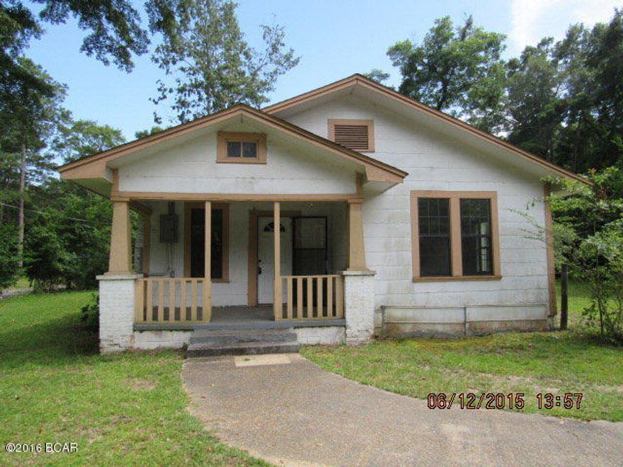 PRICE REDUCED * This is a 4 bedroom home in town on a nice corner lot. It has had some updates and would make a great rental income property. It has a nice part fenced yard and has a metal yard building. There is a covered front porch to enjoy sitting and chatting with neighbors on. It has city water, sewer, gas and garbage.